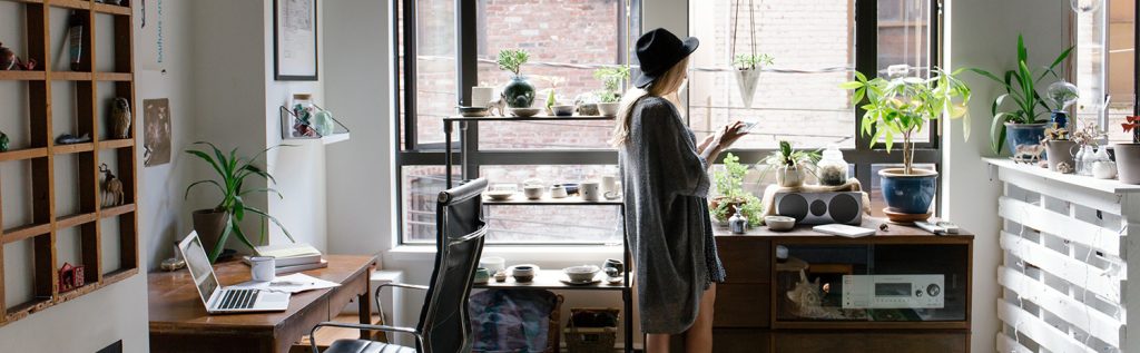 Girl using technology in apartment